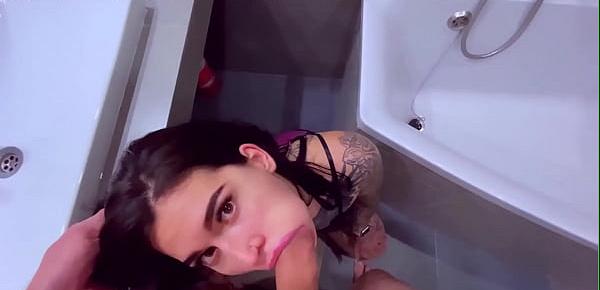 Tattooslutwife sucks a big cock in the bathroom. Gets a load in big mouth